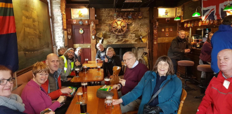 Group of people meeting in pub | 100 Homes Project